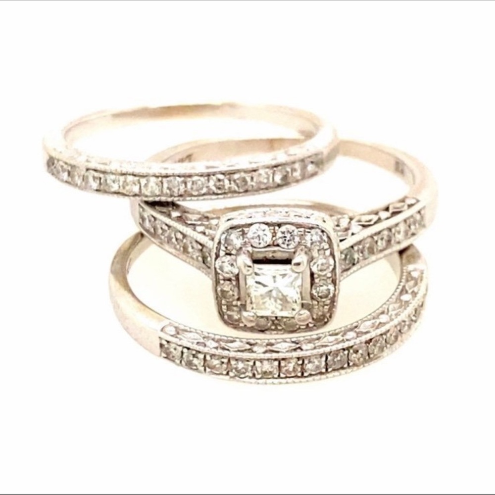 Kay’s jewelers 14k halo diamond wedding set with two bands.